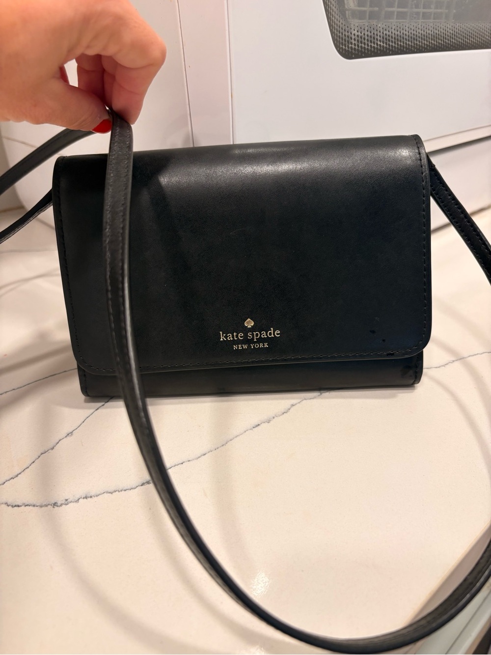 kate spade black leather flap crossbody with gold logo